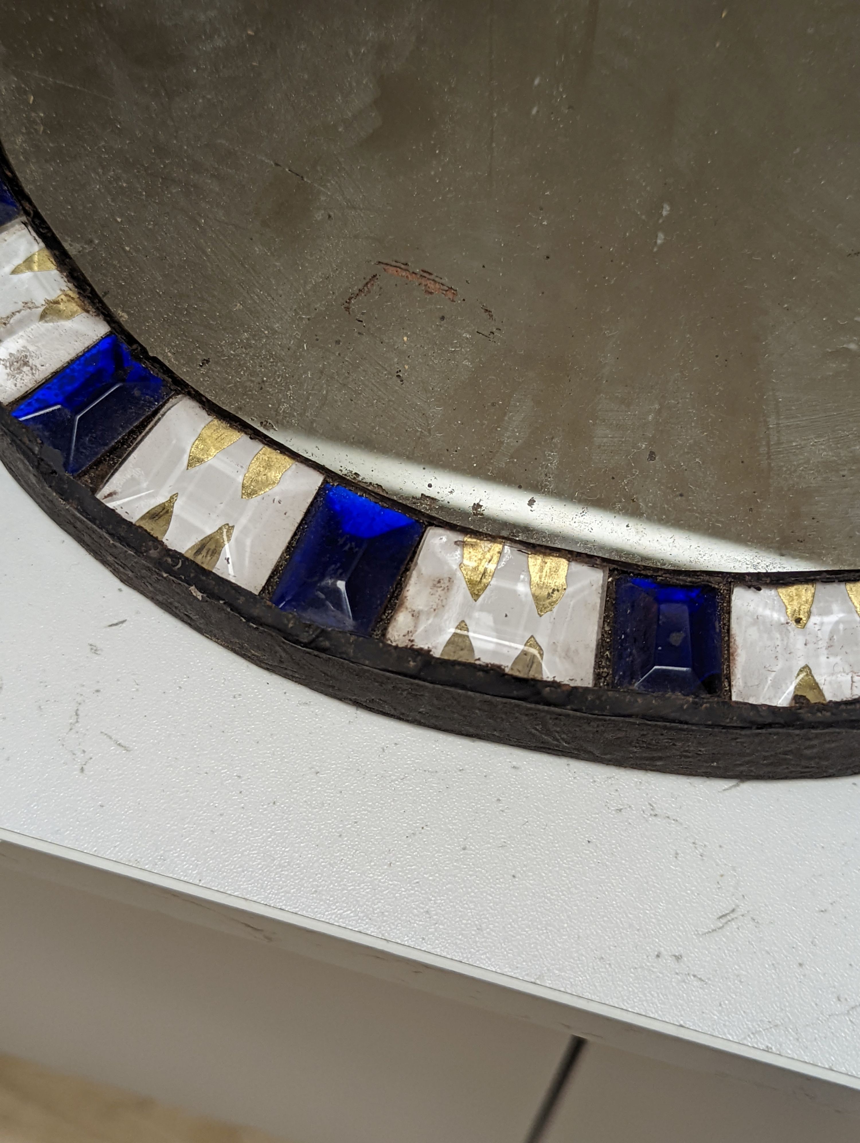 An oval Irish-style wall mirror, 56x41cm